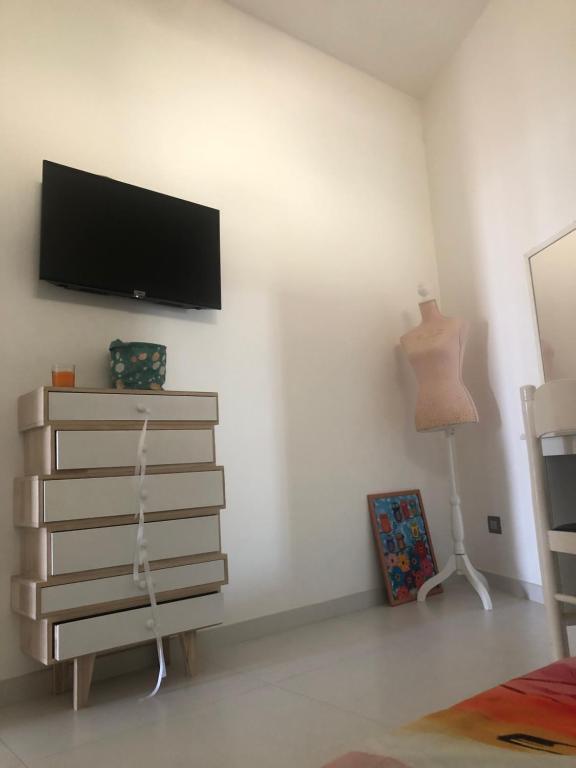 TV a/nebo společenská místnost v ubytování Manu's House Villetta Indipendente
