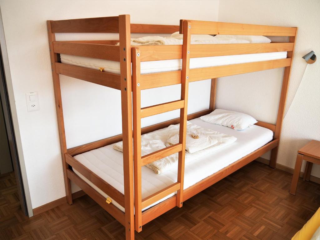 Postel nebo postele na pokoji v ubytování Jugendherberge Romanshorn