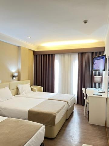 Voodi või voodid majutusasutuse Seculo Hotel toas