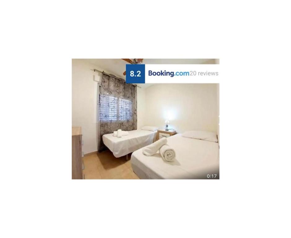 Postel nebo postele na pokoji v ubytování Elisa apartament