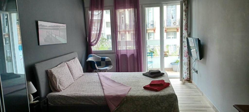 Postel nebo postele na pokoji v ubytování Cute central apartments