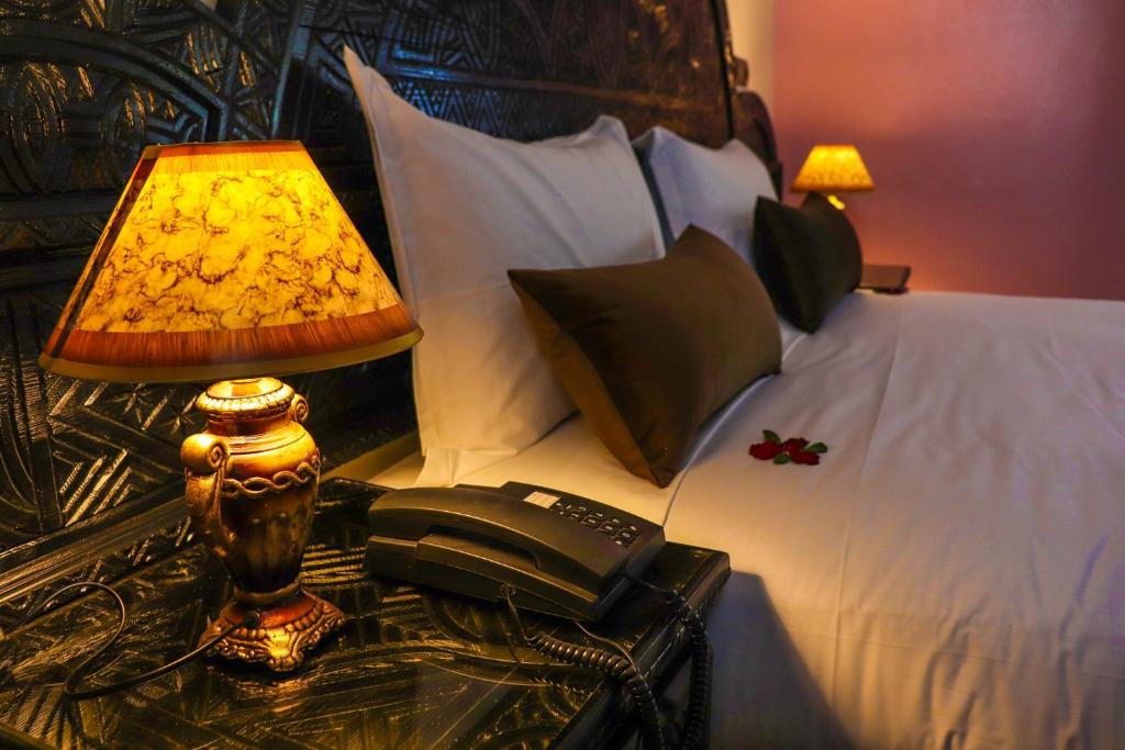Cama o camas de una habitación en Hôtel Riad Salam Agadir