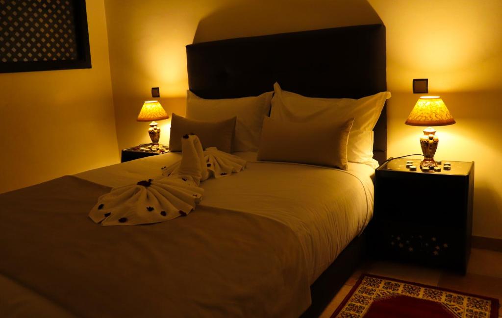 Cama o camas de una habitación en Hôtel Riad Salam Agadir