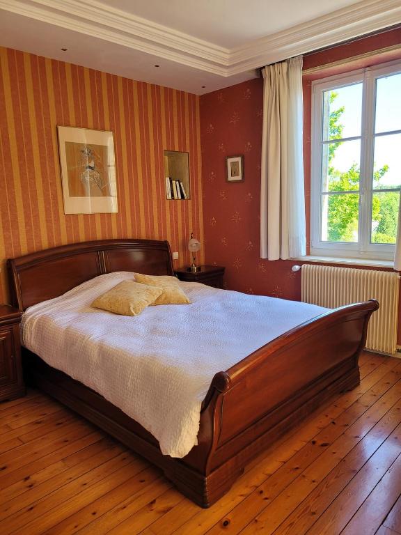 Postel nebo postele na pokoji v ubytování Villa Matignon