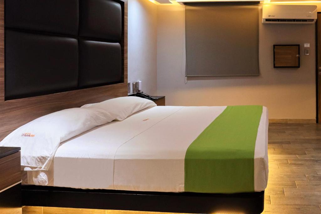 Postel nebo postele na pokoji v ubytování Auto-Hotel Playa Linda