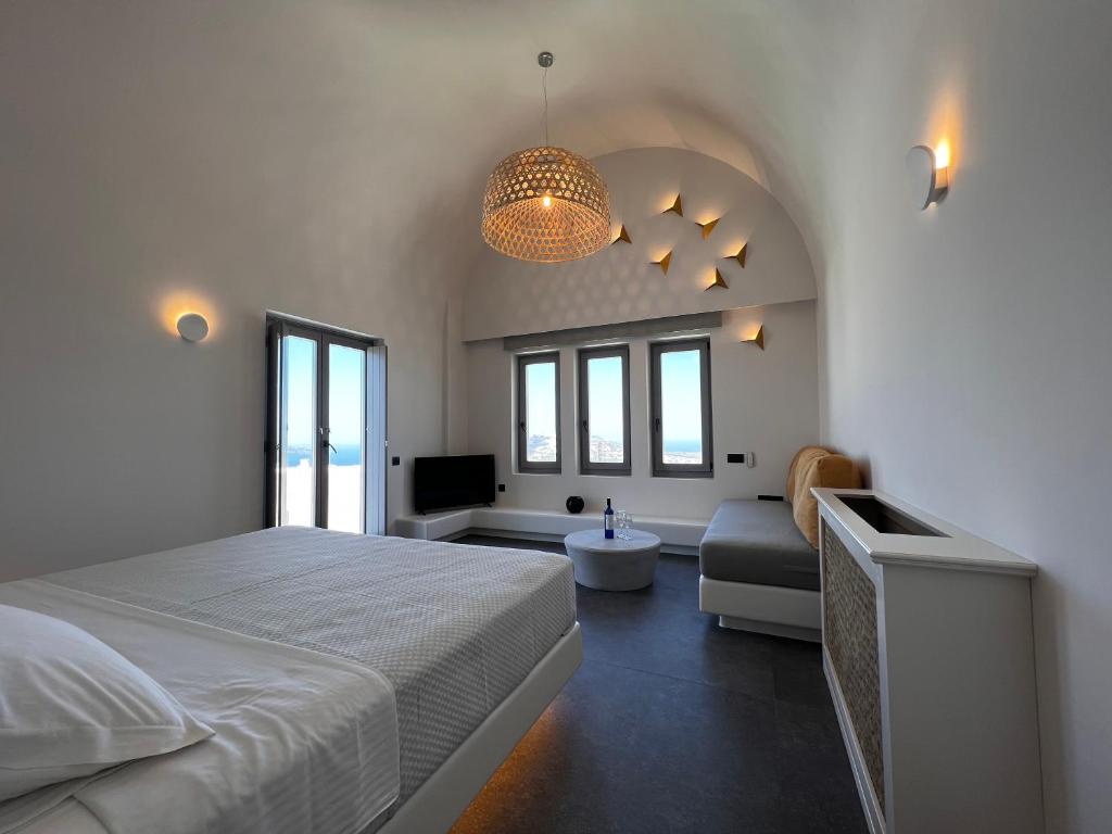 Postel nebo postele na pokoji v ubytování Elements Cozy Suites Pyrgos