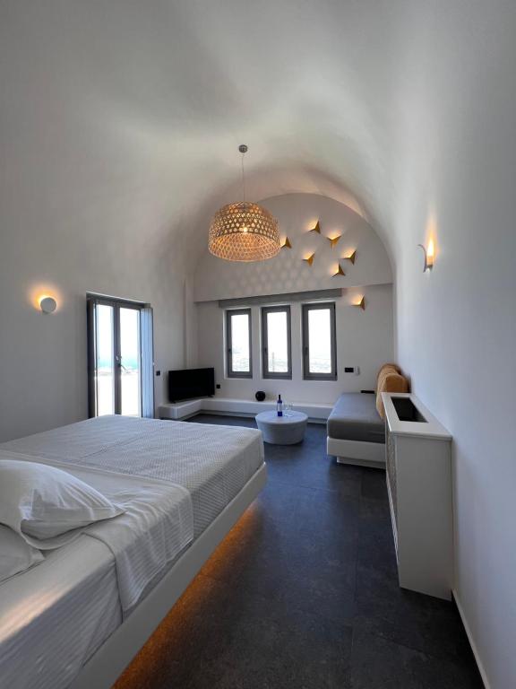 Postel nebo postele na pokoji v ubytování Elements Cozy Suites Pyrgos