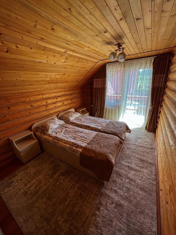 Postel nebo postele na pokoji v ubytování GorodOk