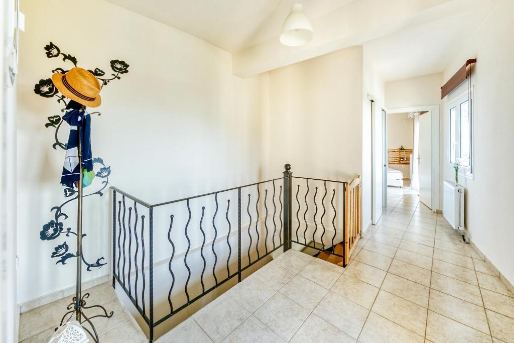 Posteľ alebo postele v izbe v ubytovaní Rafaela's House Sokraki