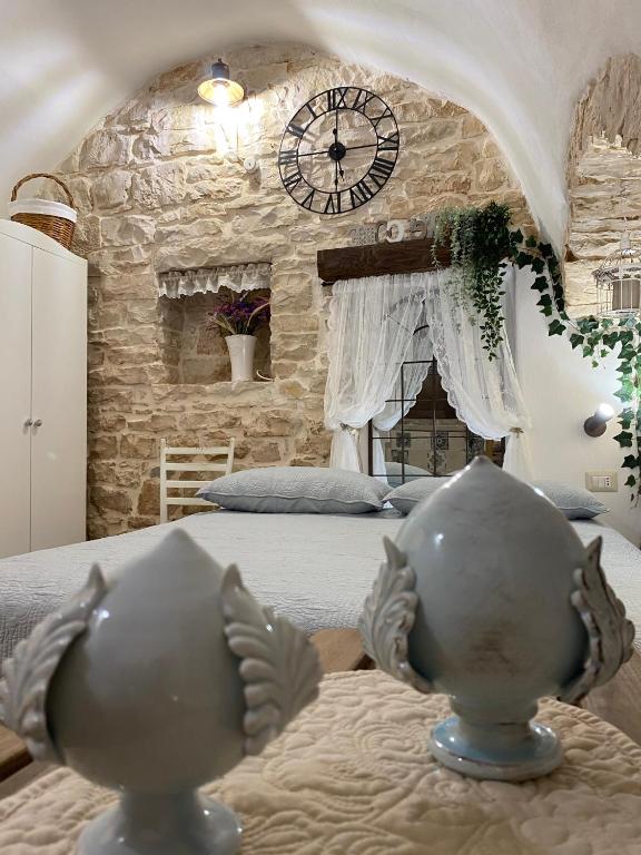 Postel nebo postele na pokoji v ubytování Domus Klara
