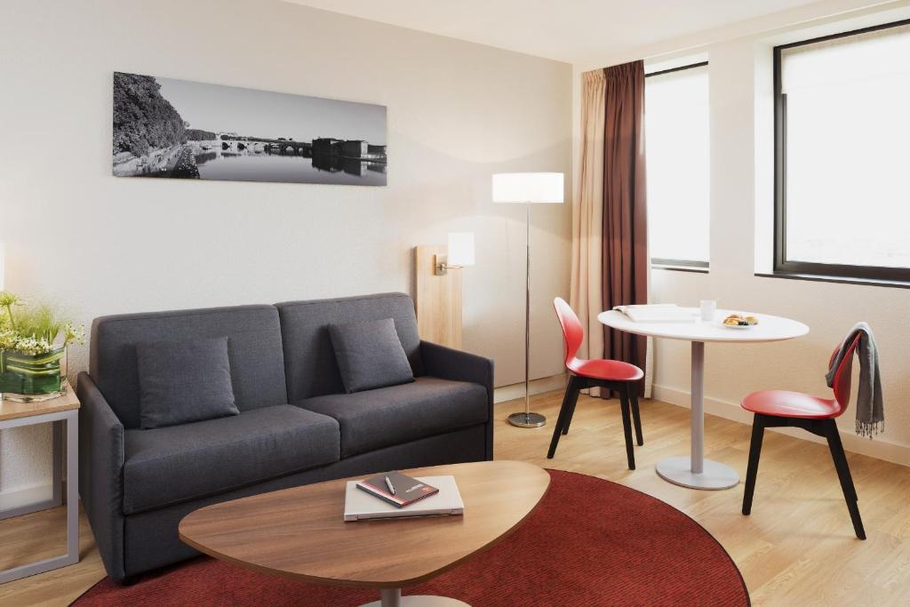 Un lugar para sentarse en Aparthotel Adagio Toulouse Centre Ramblas