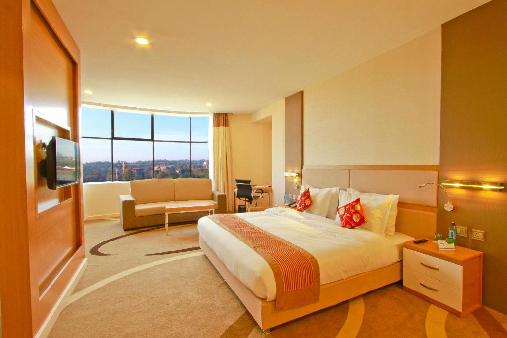 Postel nebo postele na pokoji v ubytování PrideInn Azure Hotel Nairobi Westlands