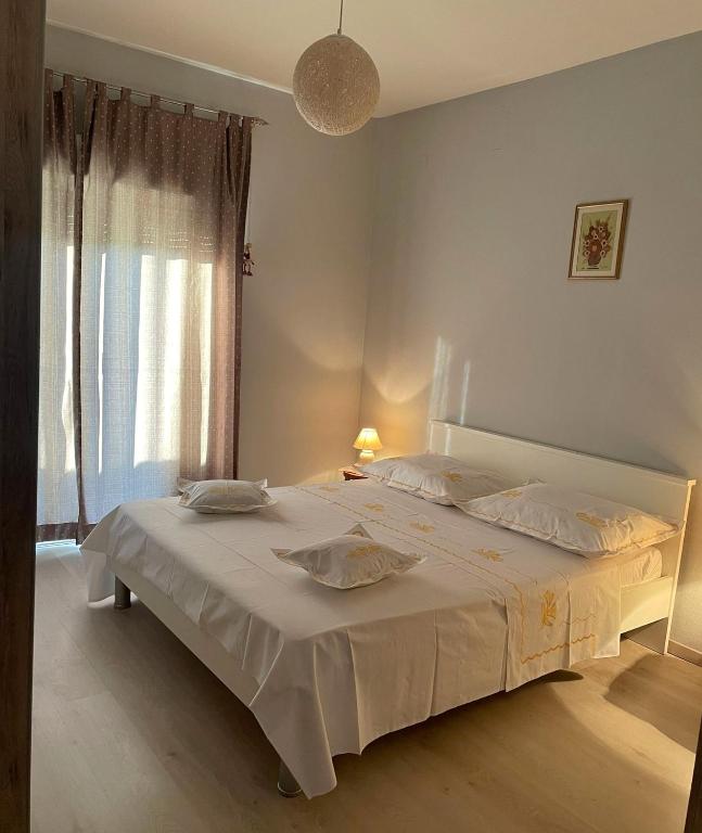 Posteľ alebo postele v izbe v ubytovaní Sun side