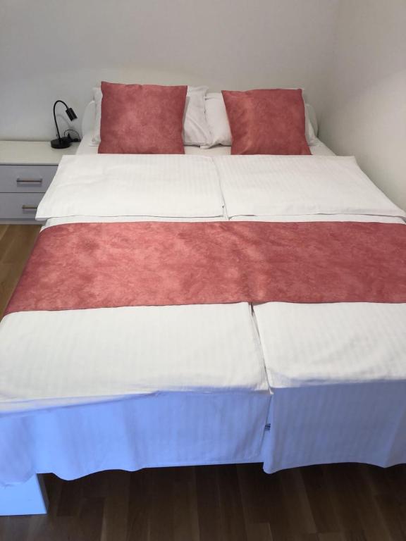 Postel nebo postele na pokoji v ubytování Apartmani Gavran