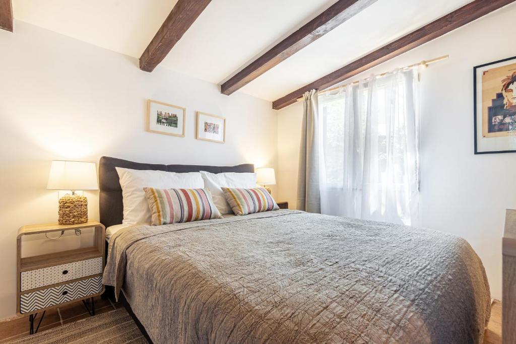 Postel nebo postele na pokoji v ubytování Villa Pinus