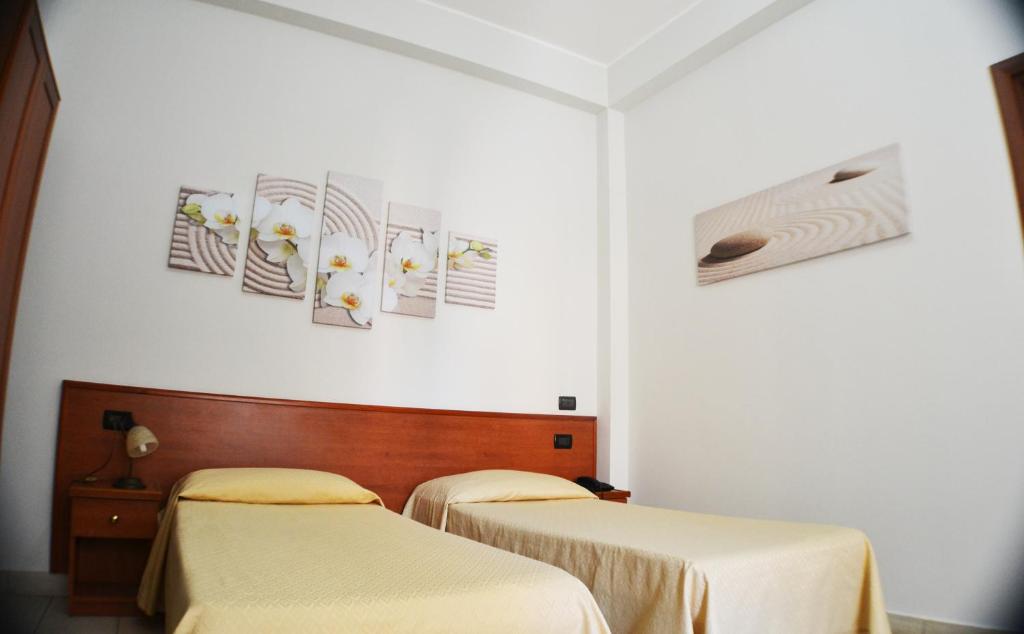 Postel nebo postele na pokoji v ubytování B&B Centrale Affittacamere