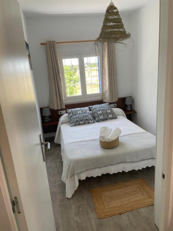 Postel nebo postele na pokoji v ubytování CA NA CATALINA DEN ANDREU
