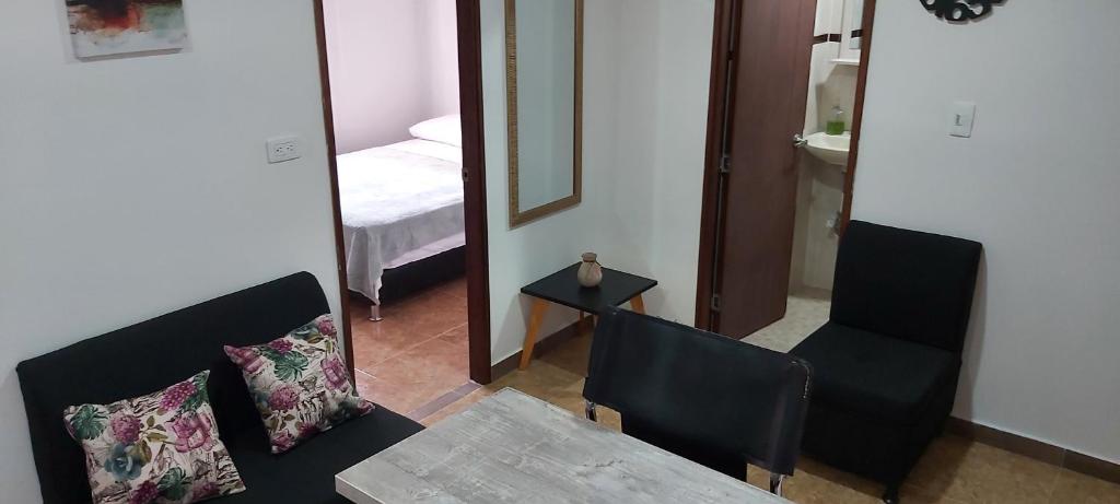 Postel nebo postele na pokoji v ubytování Cómodo apartaestudio con excelente ubicación