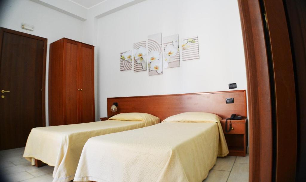 Postel nebo postele na pokoji v ubytování B&B Centrale Affittacamere