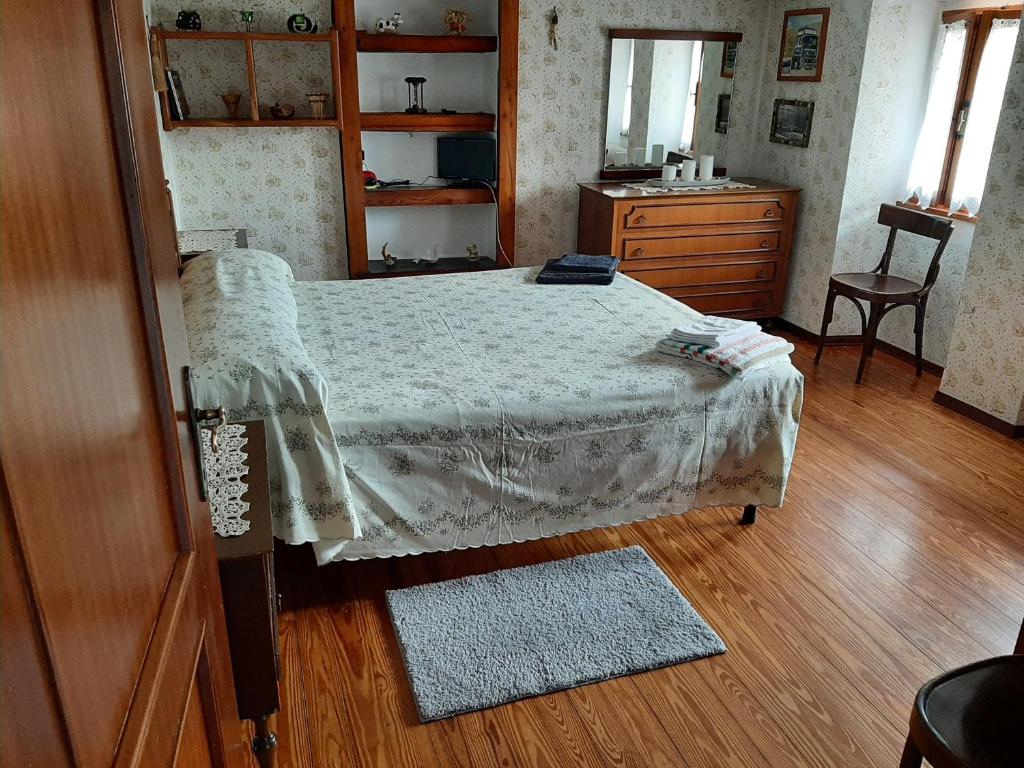 מיטה או מיטות בחדר ב-CA DUL DALU