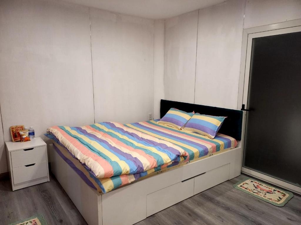 Postel nebo postele na pokoji v ubytování Dong Thanh Ecolodge Homestay