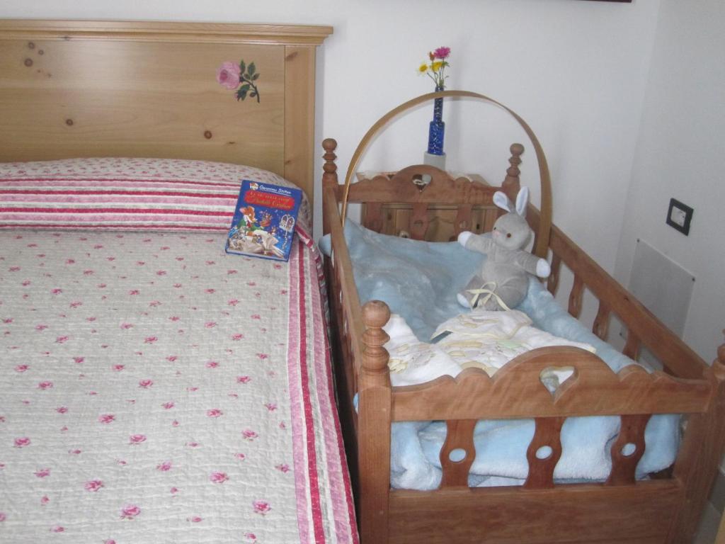 Posteľ alebo postele v izbe v ubytovaní R&B La Gerla Blu
