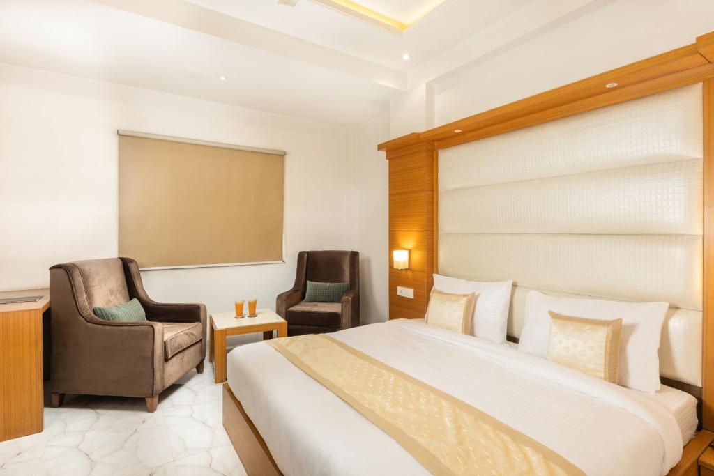 Postel nebo postele na pokoji v ubytování Hotel Star By Star Group- Near Delhi Airport