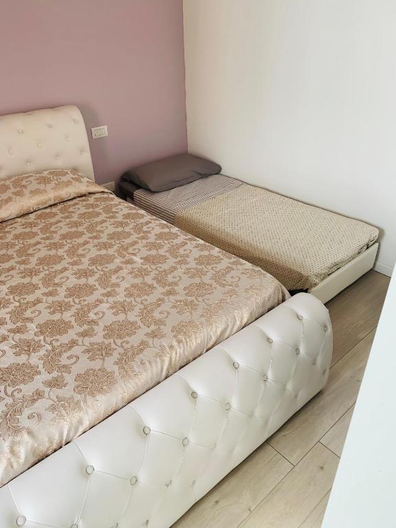 Postel nebo postele na pokoji v ubytování INTERNO 2 Este centro