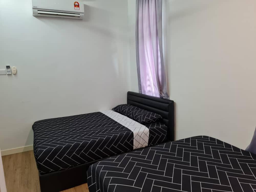 Postel nebo postele na pokoji v ubytování Pearl Residences Sleep 27