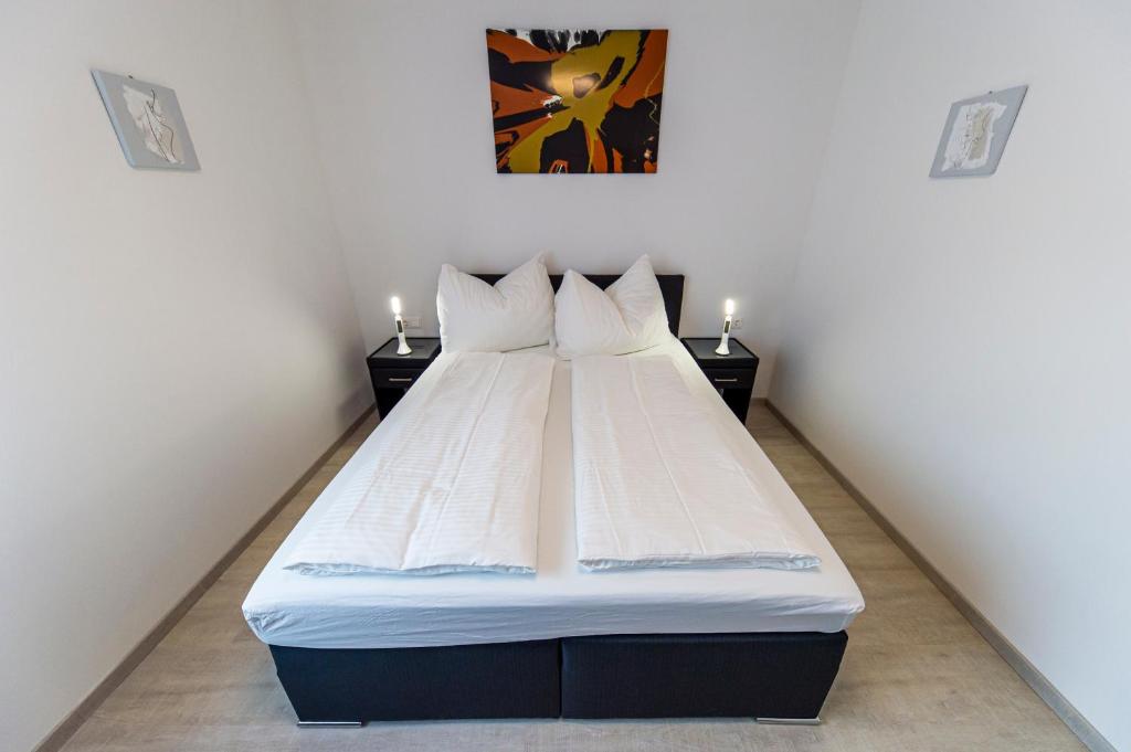 Postel nebo postele na pokoji v ubytování Zeltweg-Rooms