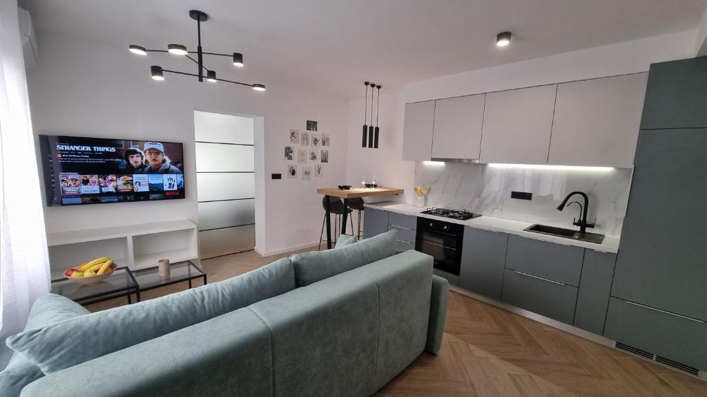 Kuchyň nebo kuchyňský kout v ubytování Aquamarine apartment - Free 2 electric scooters