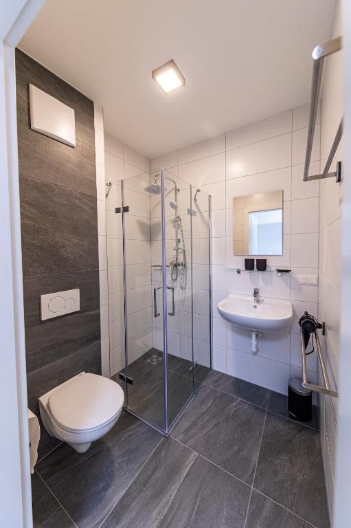 Koupelna v ubytování Zeltweg-Rooms
