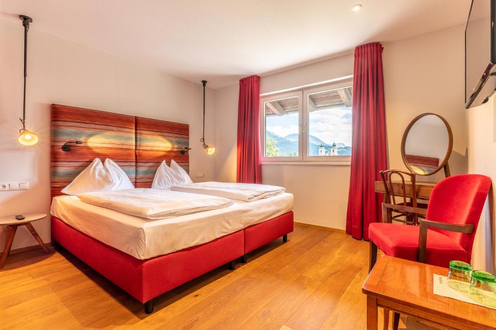 Postel nebo postele na pokoji v ubytování Hotel Bruggwirt