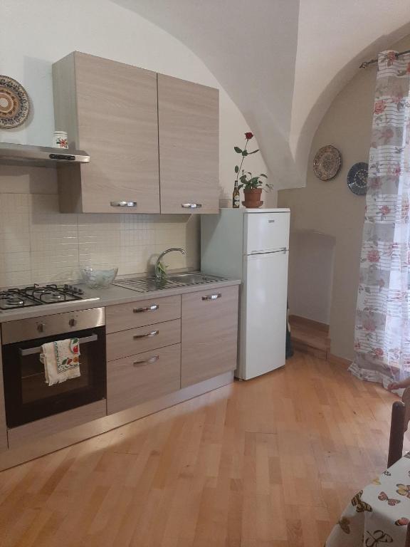 Kuchyň nebo kuchyňský kout v ubytování Alloggi Piazza Umberto Primo