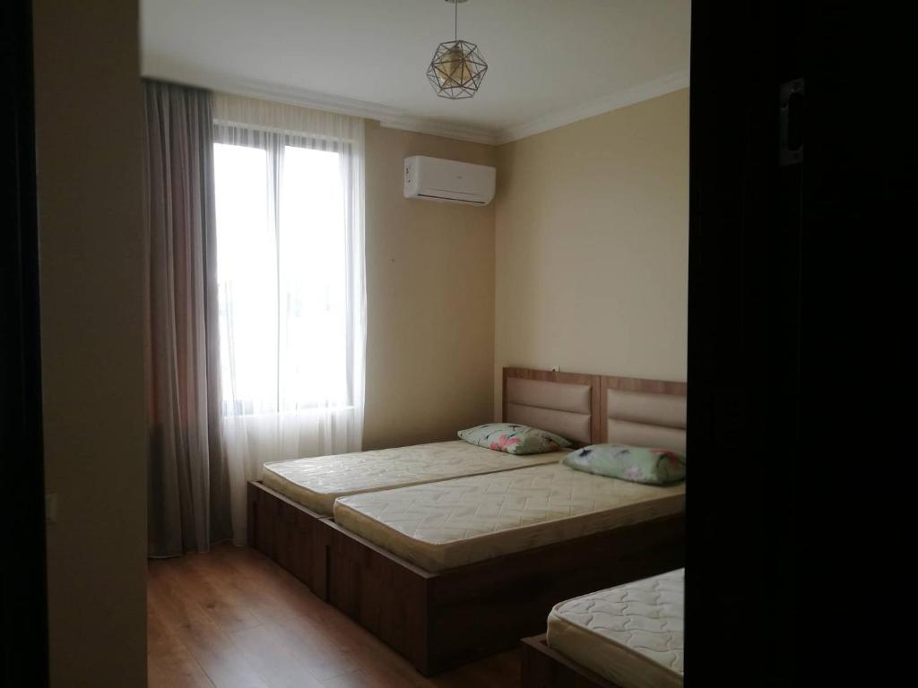 Postel nebo postele na pokoji v ubytování Mate's GUEST HOUSE