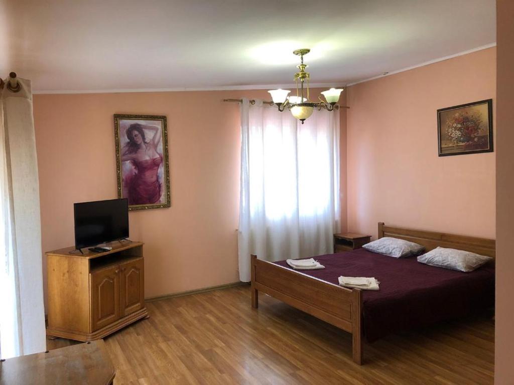 Postel nebo postele na pokoji v ubytování Hotel Nikolet