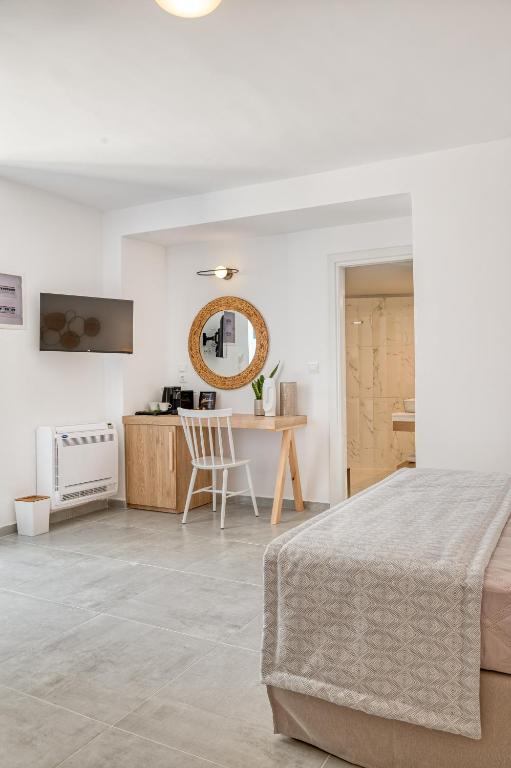 Télévision ou salle de divertissement dans l'établissement Lumiére spetses