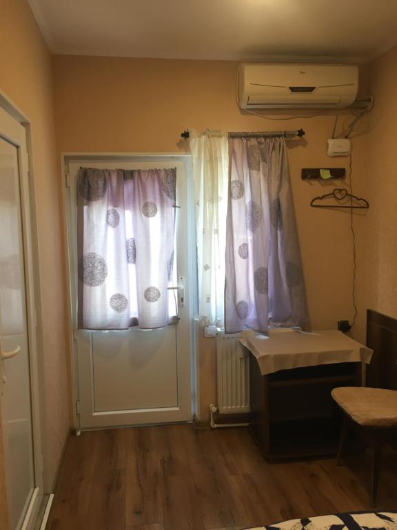 Postel nebo postele na pokoji v ubytování Apartment Zaziashvili 30