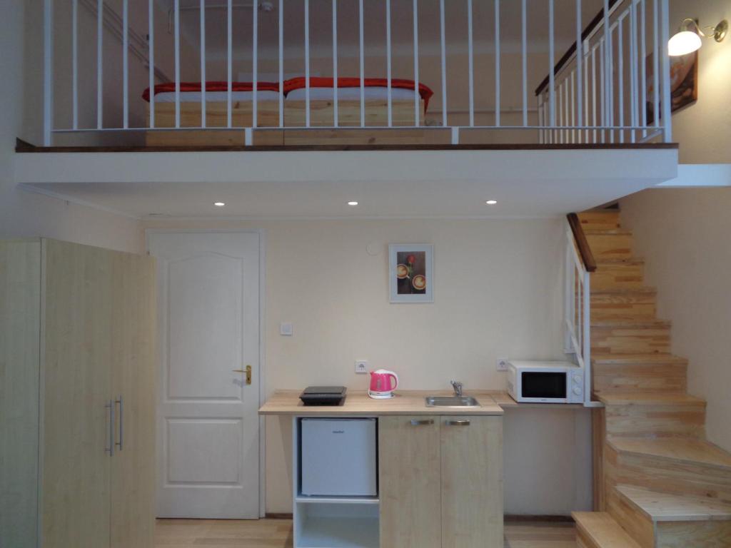 Kuchyň nebo kuchyňský kout v ubytování Loft House Budapest