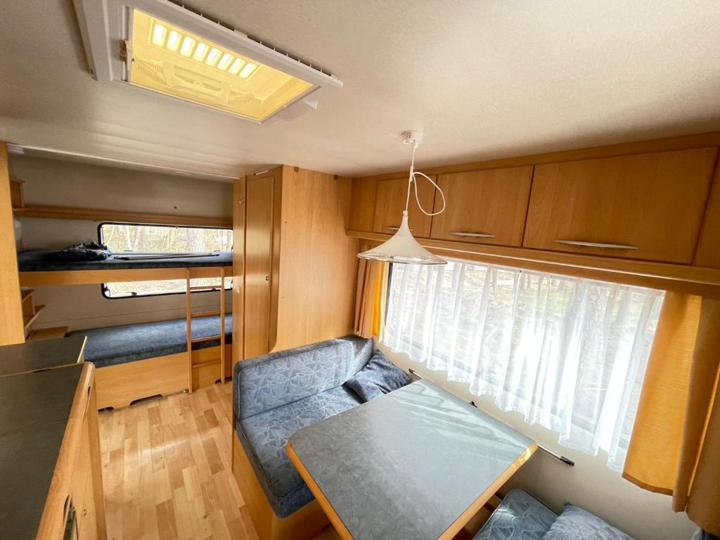 Postel nebo postele na pokoji v ubytování Your Camp Kormoran