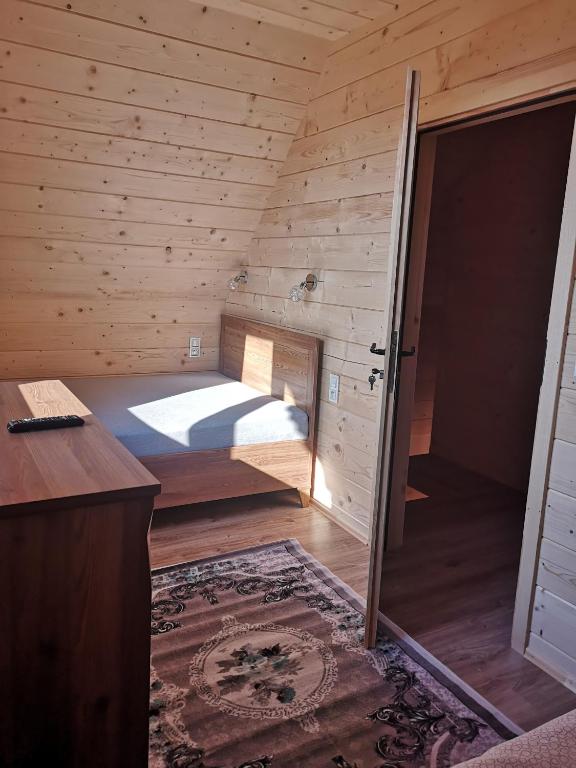Posteľ alebo postele v izbe v ubytovaní DOMEK POD LIMBAMI V
