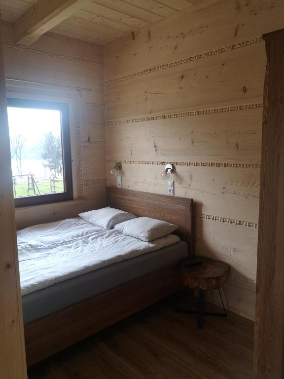 Posteľ alebo postele v izbe v ubytovaní DOMEK POD LIMBAMI V