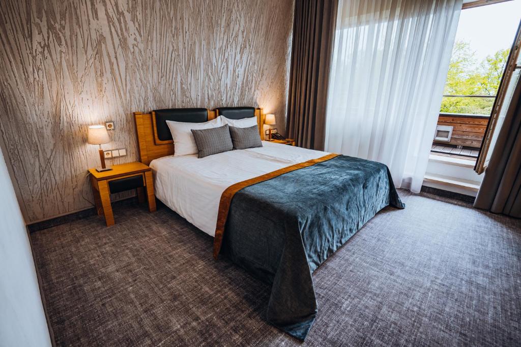 Lova arba lovos apgyvendinimo įstaigoje Gabija Hotel SPA & Conferences