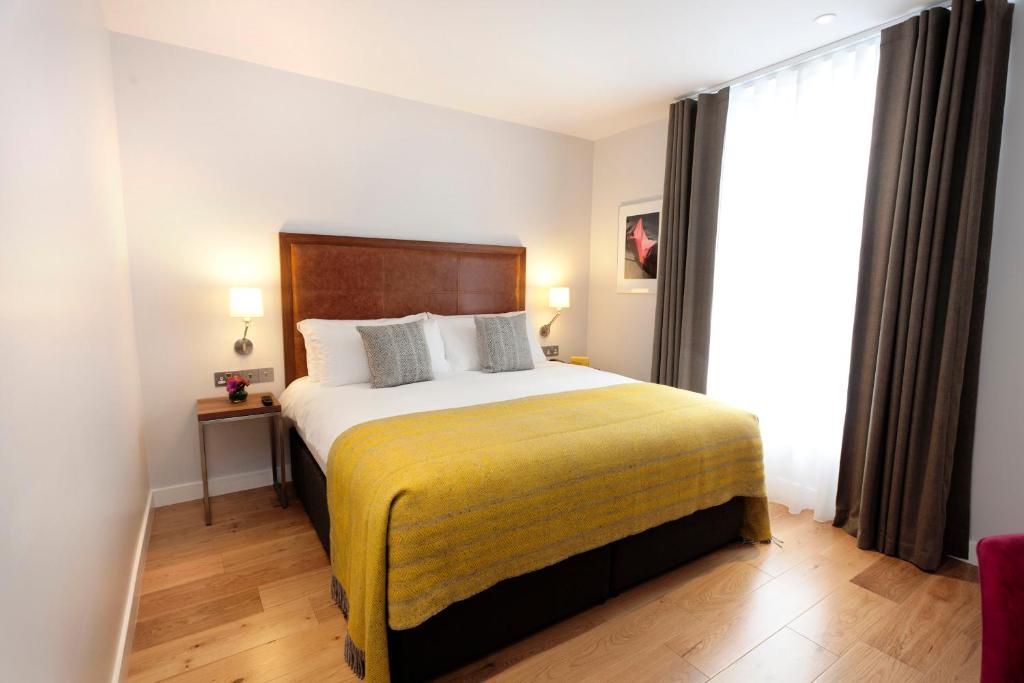 Cama o camas de una habitación en PREMIER SUITES PLUS Dublin, Ballsbridge