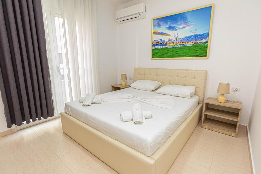 Postel nebo postele na pokoji v ubytování Jordan`s Hotel