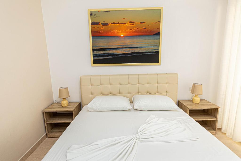 Postel nebo postele na pokoji v ubytování Jordan`s Hotel