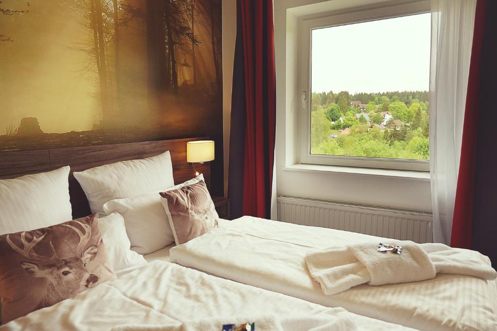 Postel nebo postele na pokoji v ubytování Hotel Mein Bergblick
