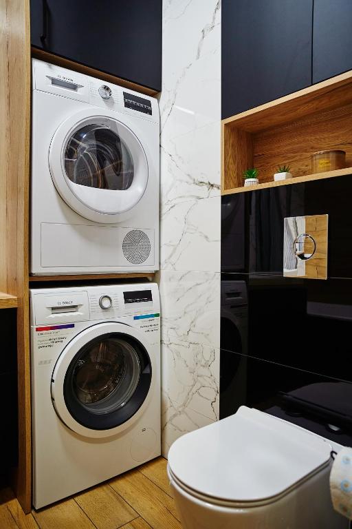 Fotografia z galérie ubytovania Apartament ,, COŚ NIECOŚ ,, Suwałki LOFT, KLIMATYZACJA, PRYWATNY PARKING, MONITOROWANE ZAMKNIĘTE OSIEDLE v destinácii Suwałki
