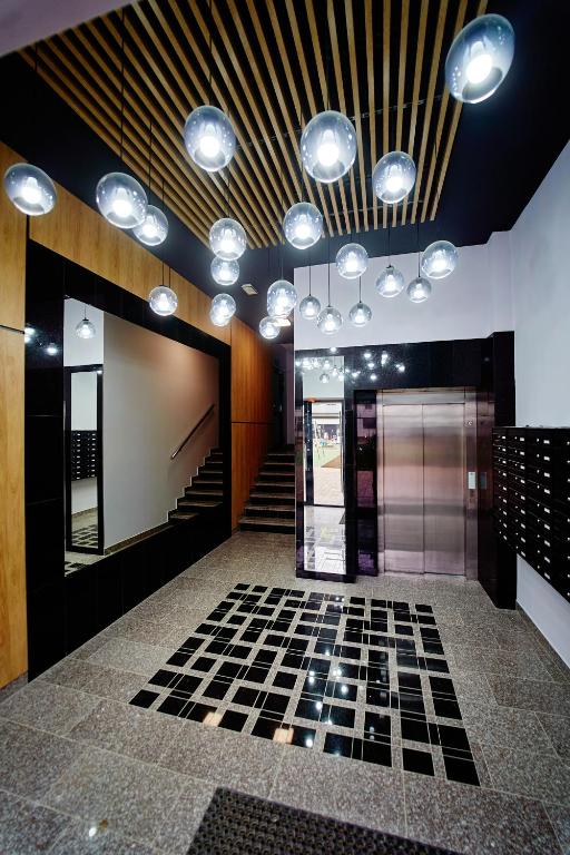 Fotografia z galérie ubytovania Apartament ,, COŚ NIECOŚ ,, Suwałki LOFT, KLIMATYZACJA, PRYWATNY PARKING, MONITOROWANE ZAMKNIĘTE OSIEDLE v destinácii Suwałki