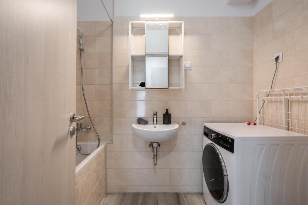 Kúpeľňa v ubytovaní Szabolcs Apartments
